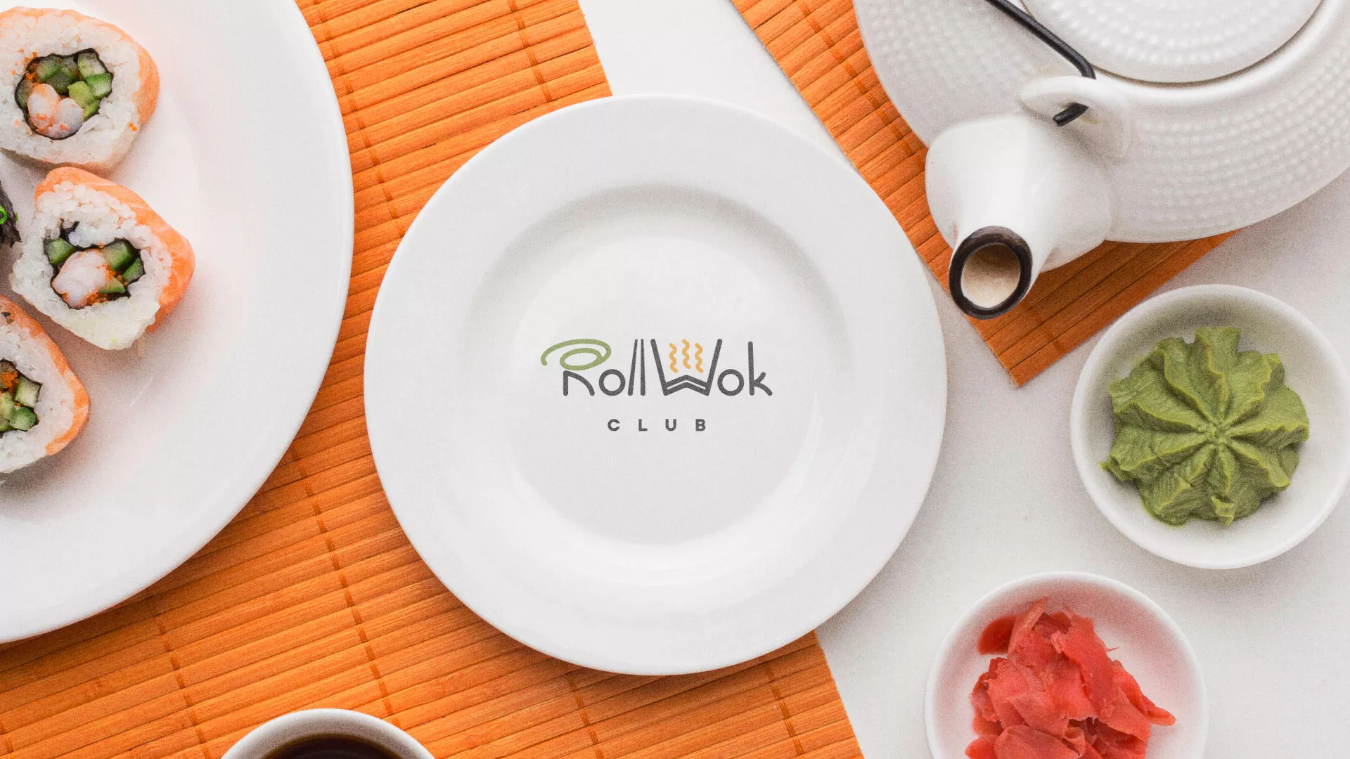 Разработка логотипа и фирменного стиля в Валдае для суши-бара «Roll Wok Club» Разработка логотипа и фирменного стиля в Валдае для суши-бара «Roll Wok Club»
